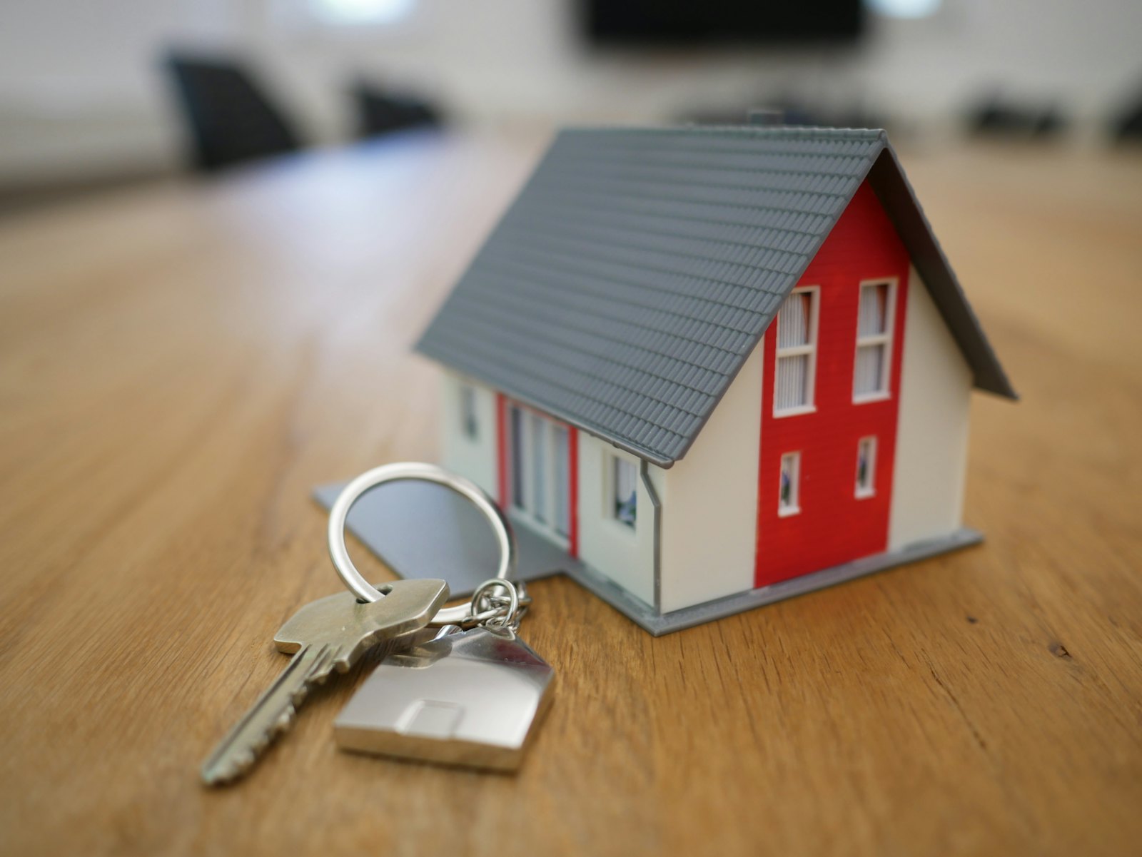 A home listing's estimated monthly payment shown beside a longer, fuller list of the real monthly costs of ownership